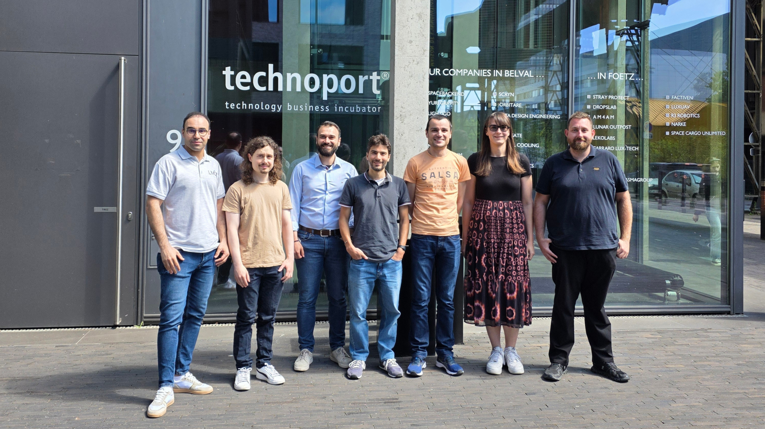 Infinite Orbits Luxembourg team outside the Technoport building