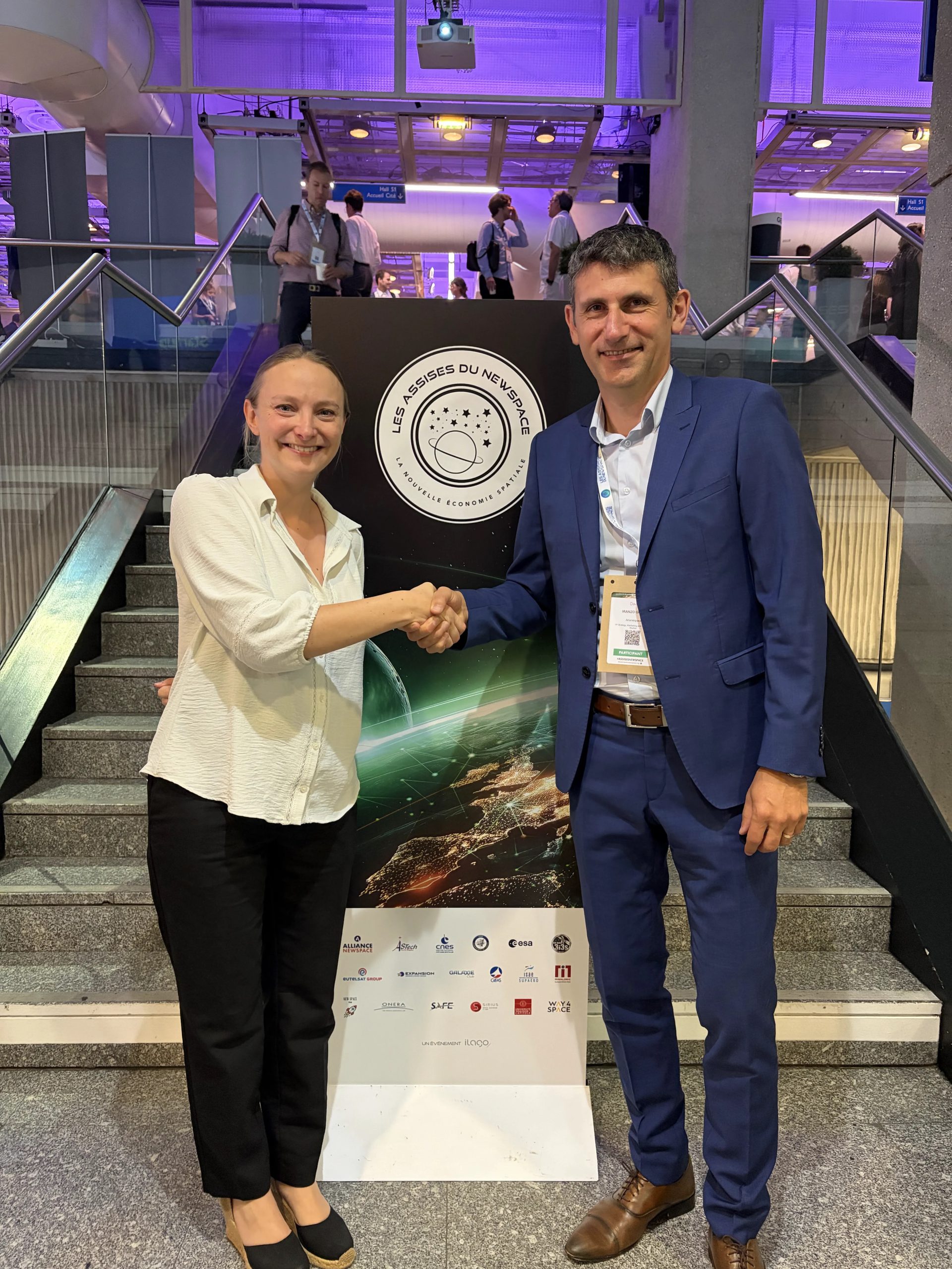 Representatives of Infinite Orbits and Arianespace at the memorandum signing
